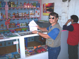 The author with phony land deeds in the post office/convenience store.